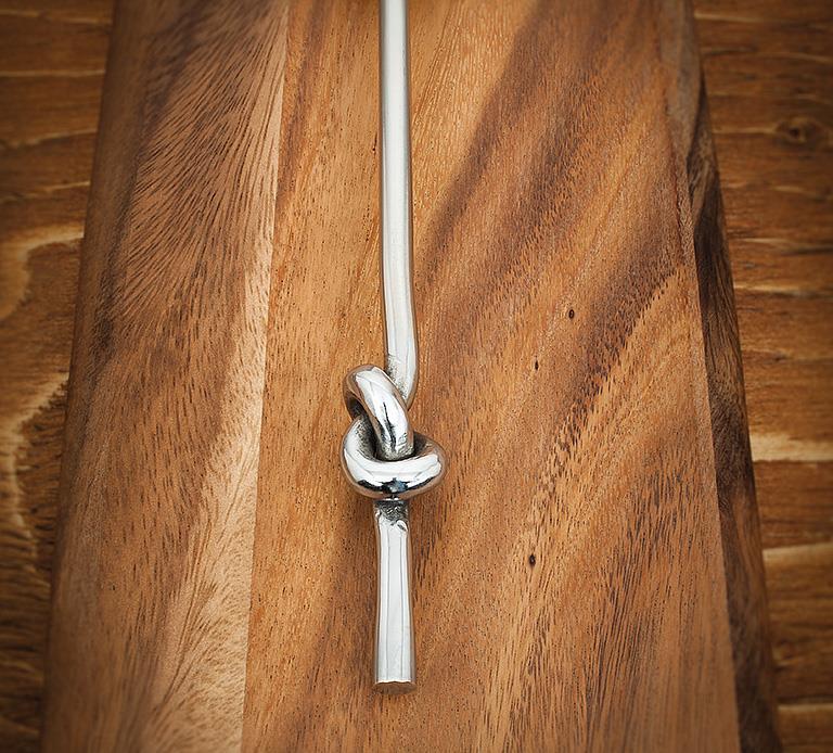 Silver knot cheese spreader handle