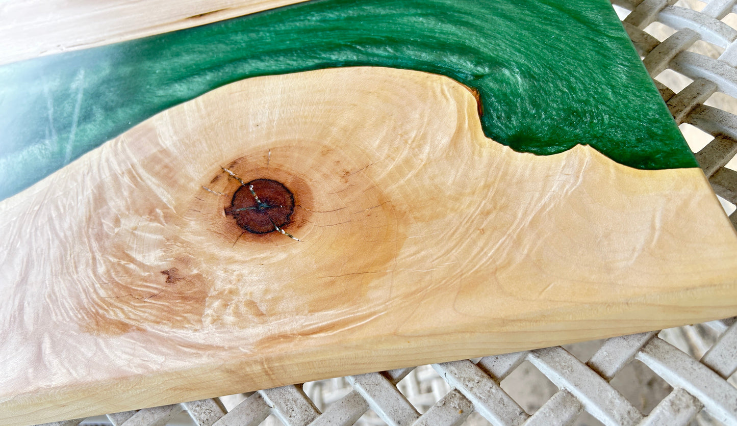 Wooden slab with green resin finish