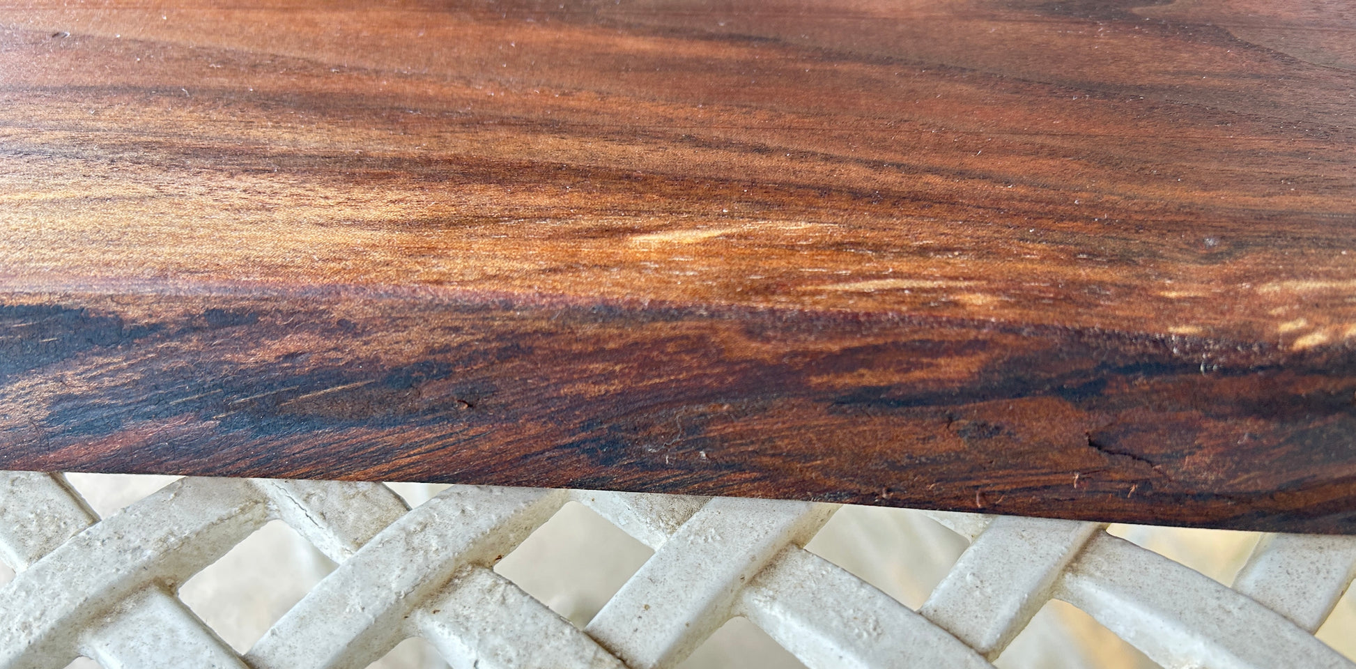 Close-up of a wooden surface with visible grain and texture