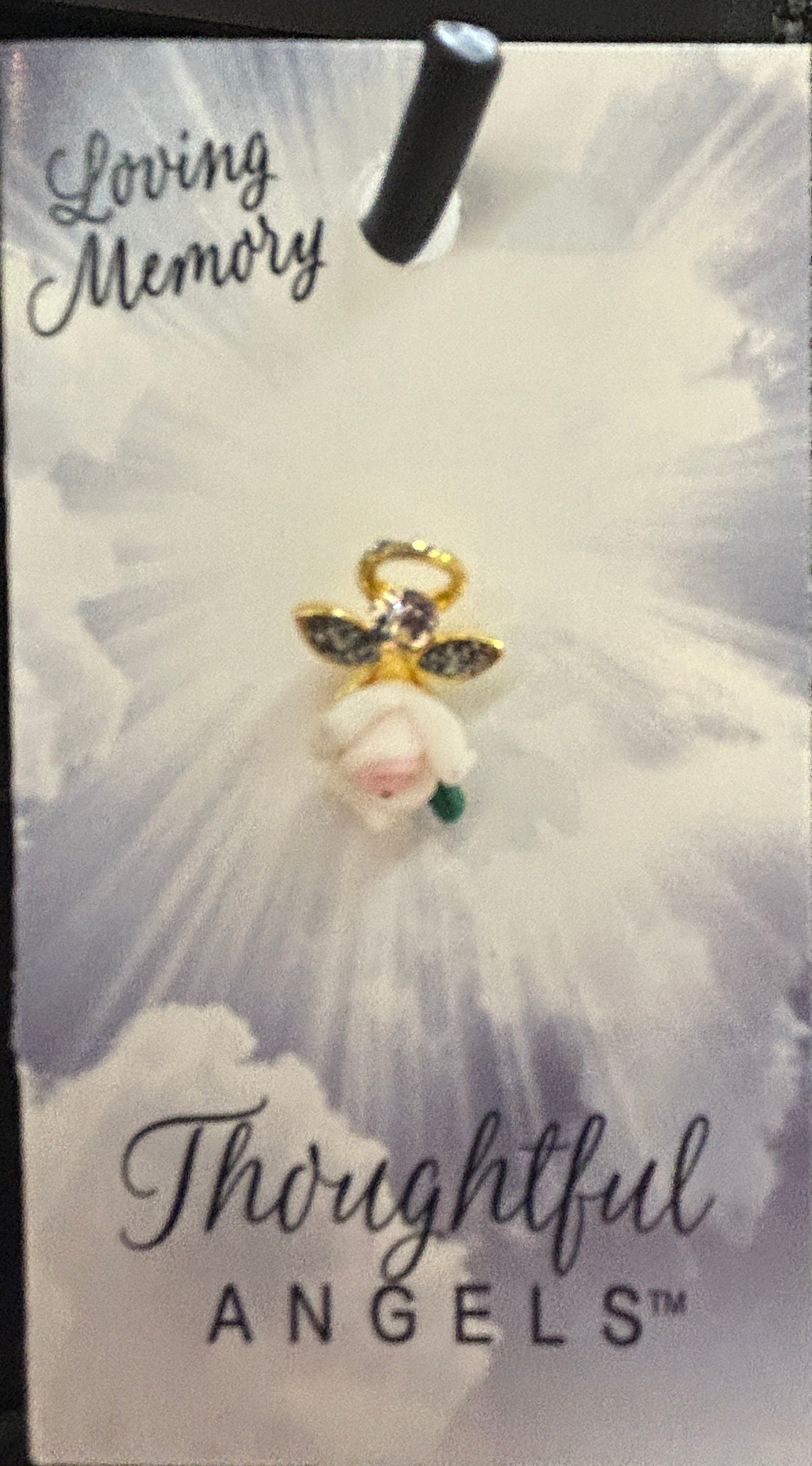 Card with 'Loving Memory' and 'Thoughtful Angels' text, featuring a floral design.