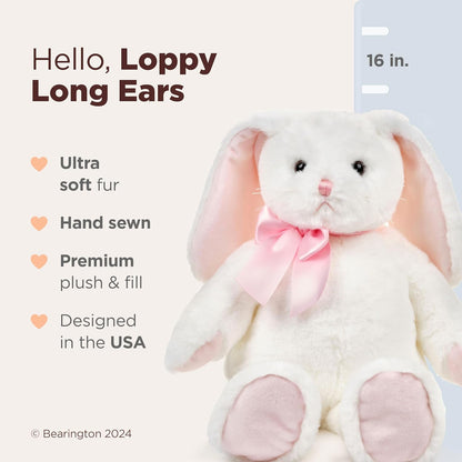 Plush bunny toy with pink bow and text highlighting features